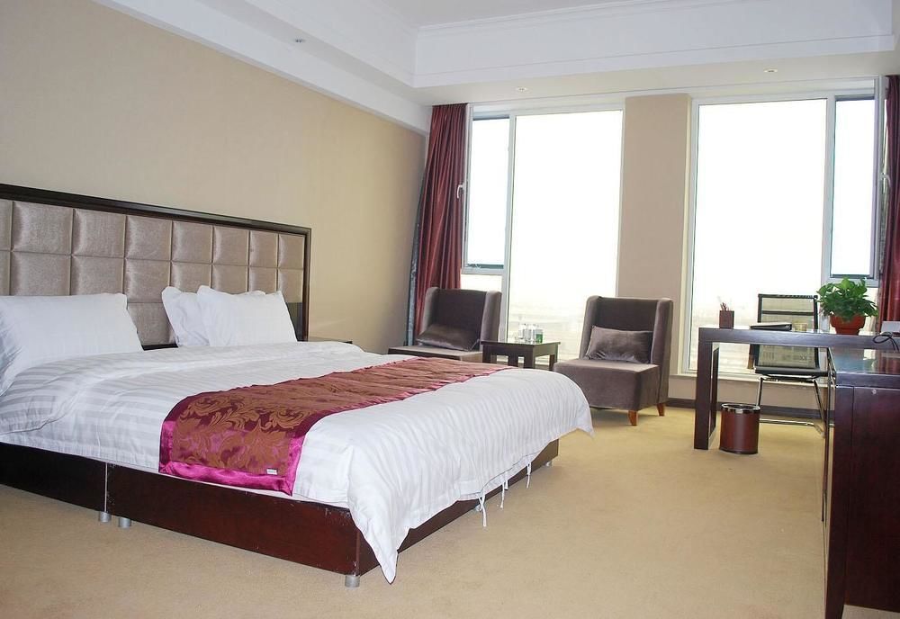 Weishi International Hotel Qing Zhou Екстериор снимка