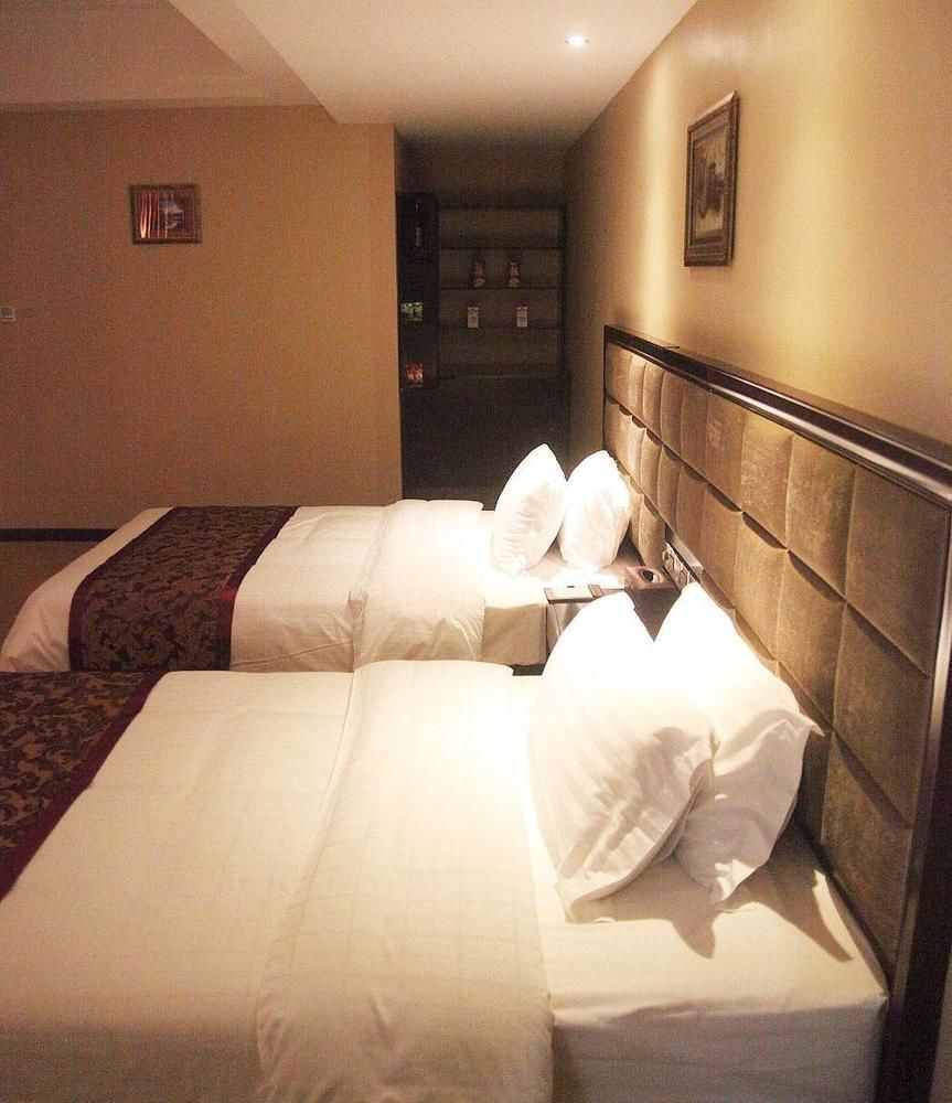 Weishi International Hotel Qing Zhou Екстериор снимка