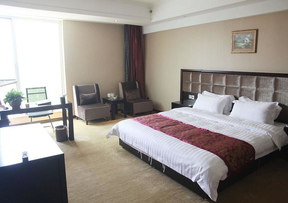 Weishi International Hotel Qing Zhou Екстериор снимка