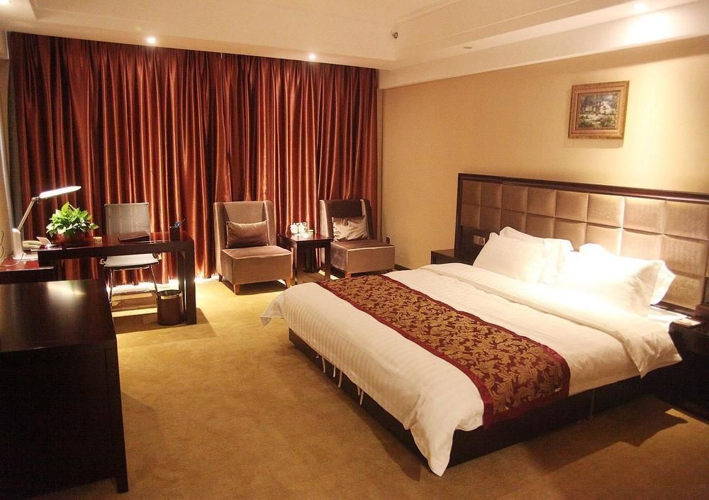 Weishi International Hotel Qing Zhou Екстериор снимка